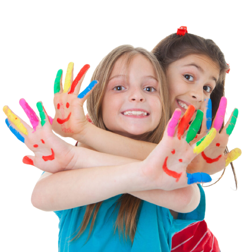 Two girls with painted hands and smiling faces.